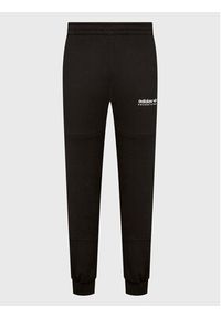 Adidas - adidas Spodnie dresowe Adventure HK5001 Czarny Regular Fit. Kolor: czarny. Materiał: dresówka, bawełna