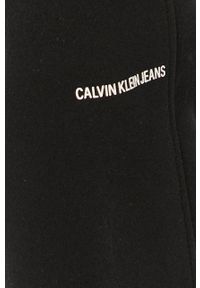 Calvin Klein Jeans - Spodnie. Kolor: czarny. Materiał: bawełna, dzianina. Wzór: gładki #2