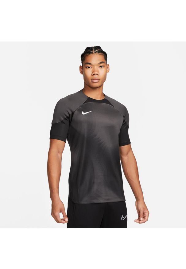 Koszulka treningowa męska Nike Gardien IV. Kolor: czarny, wielokolorowy. Długość rękawa: krótki rękaw. Długość: krótkie. Sport: piłka nożna