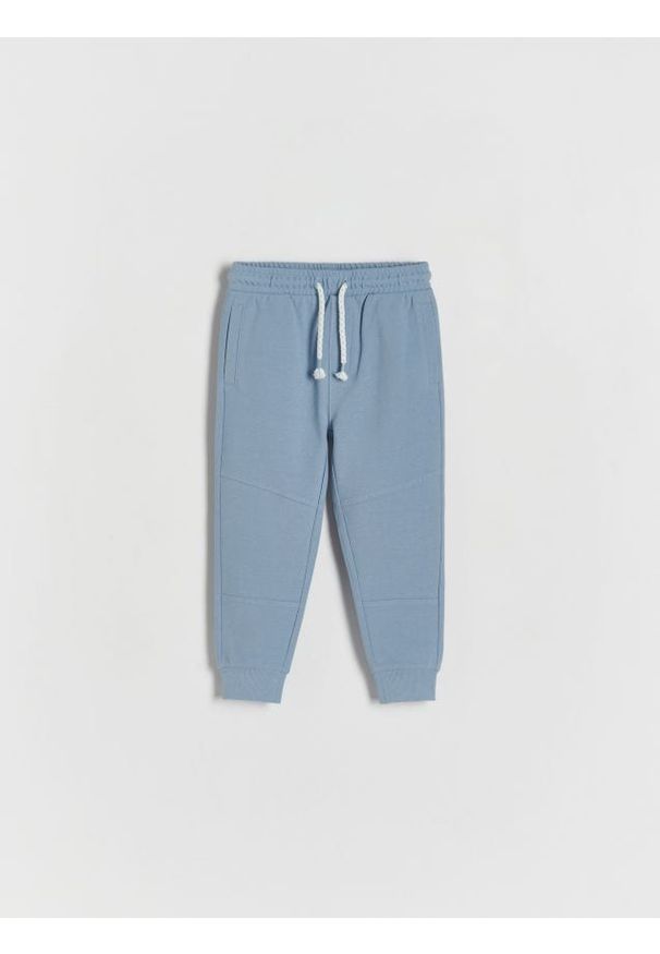 Reserved - Spodnie dresowe jogger - niebieski. Kolor: niebieski. Materiał: dresówka