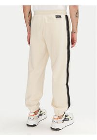 EA7 Emporio Armani Spodnie dresowe 7M000545 AF12660 U1079 Écru Modern Fit. Materiał: bawełna