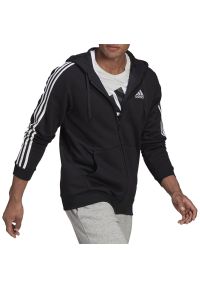 Adidas - Bluza adidas Essentials Fleece 3-Stripes Full-Zip Hoodie GK9051 - czarna. Okazja: na co dzień. Typ kołnierza: kaptur. Kolor: czarny. Materiał: wiskoza, polar, materiał, bawełna, poliester. Styl: casual, klasyczny