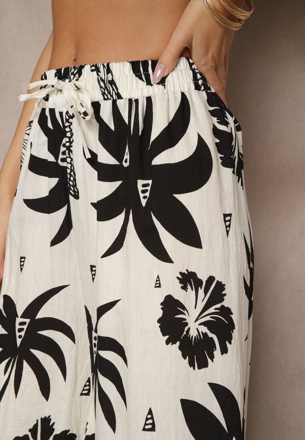 Renee - Czarno-Beżowe Szerokie Spodnie z Gumką w Pasie w Stylu Boho Evirami. Kolor: czarny. Sezon: lato. Styl: boho