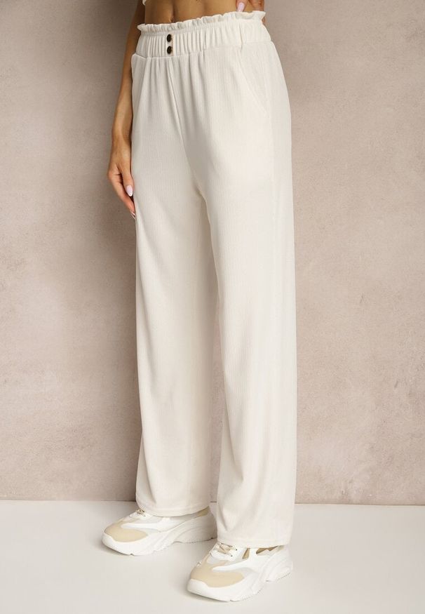 Renee - Jasnobeżowe Spodnie High Waist o Fasonie Paper Bag z Gumką w Talii Lunalitia. Okazja: na co dzień. Stan: podwyższony. Kolor: beżowy. Wzór: aplikacja. Styl: elegancki, casual