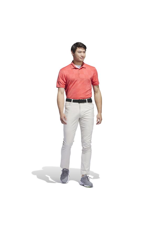 Adidas - Teksturowana koszulka polo adidas Ultimate365. Typ kołnierza: polo. Kolor: różowy, pomarańczowy, wielokolorowy. Materiał: żakard, dzianina. Styl: sportowy