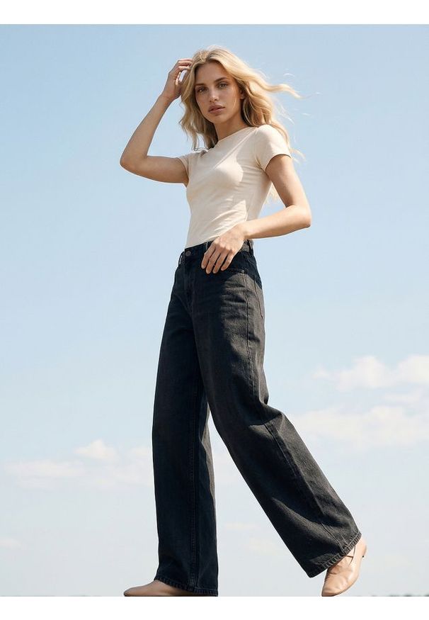 Sinsay - Jeansy wide leg z efektem sprania - czarny. Kolor: czarny