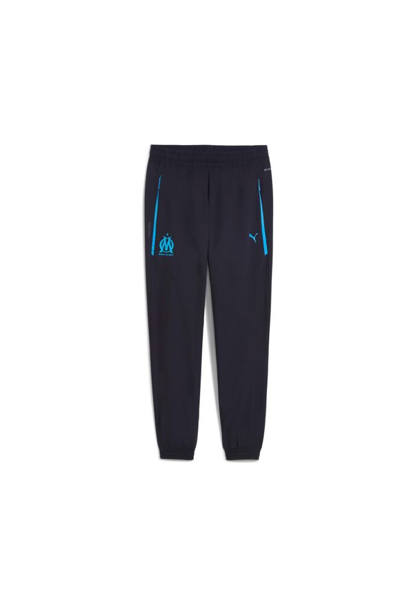 Puma - Spodnie dresowe OM Woven 2025/26. Kolor: niebieski. Materiał: dresówka. Sport: piłka nożna