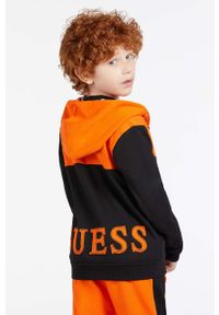 Guess bluza dziecięca kolor pomarańczowy z kapturem wzorzysta. Okazja: na co dzień. Typ kołnierza: kaptur. Kolor: pomarańczowy. Materiał: bawełna, dzianina. Styl: casual #4