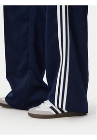 Adidas - adidas Spodnie dresowe Satin Sst Loose Trackpant KS7339 Granatowy Relaxed Fit. Kolor: niebieski. Materiał: syntetyk #5