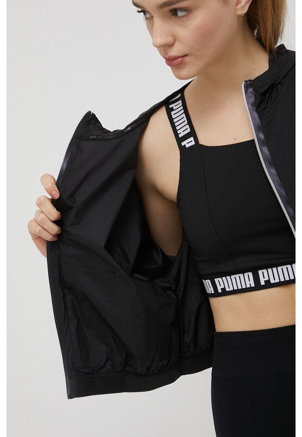Puma kurtka sportowa Stardust kolor czarny przejściowa. Kolor: czarny. Materiał: materiał, tkanina. Styl: sportowy