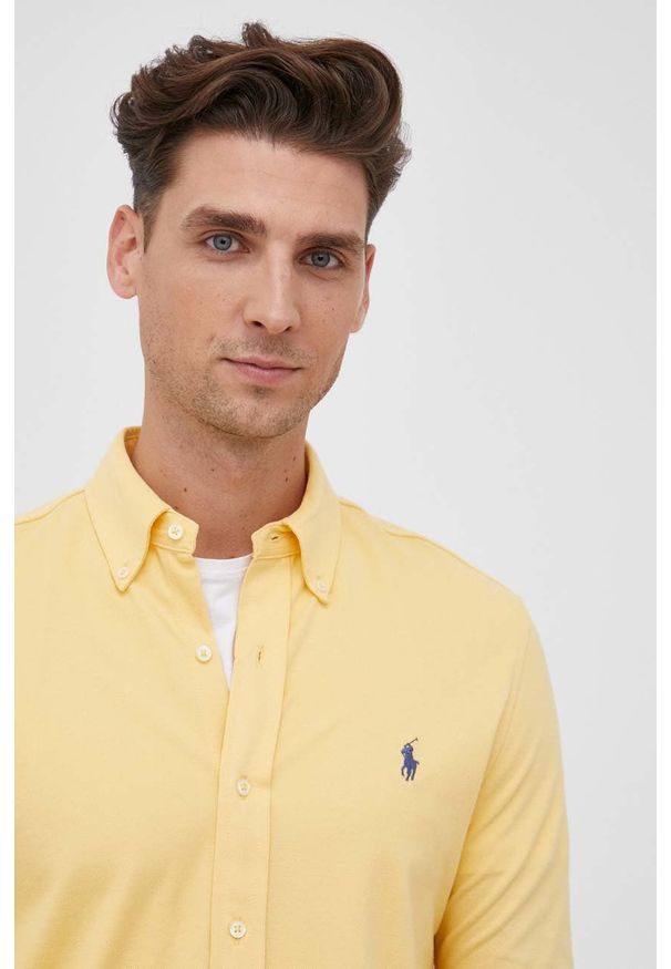 Polo Ralph Lauren Koszula bawełniana męska kolor żółty regular z kołnierzykiem button-down. Okazja: na co dzień. Typ kołnierza: polo, button down. Kolor: żółty. Materiał: bawełna. Długość rękawa: długi rękaw. Długość: długie. Wzór: aplikacja. Styl: casual