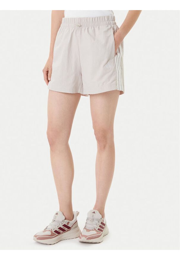 Adidas - adidas Szorty sportowe Essentials 3-Stripes JC8165 Beżowy Loose Fit. Kolor: beżowy. Materiał: syntetyk