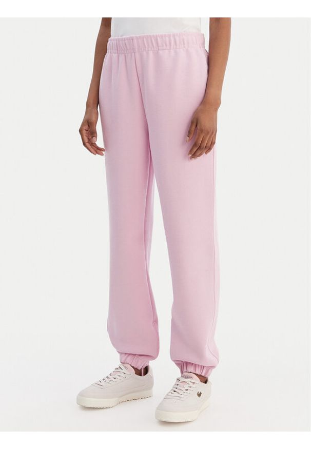 Lacoste Spodnie dresowe XF5244 Różowy Regular Fit. Kolor: różowy. Materiał: bawełna