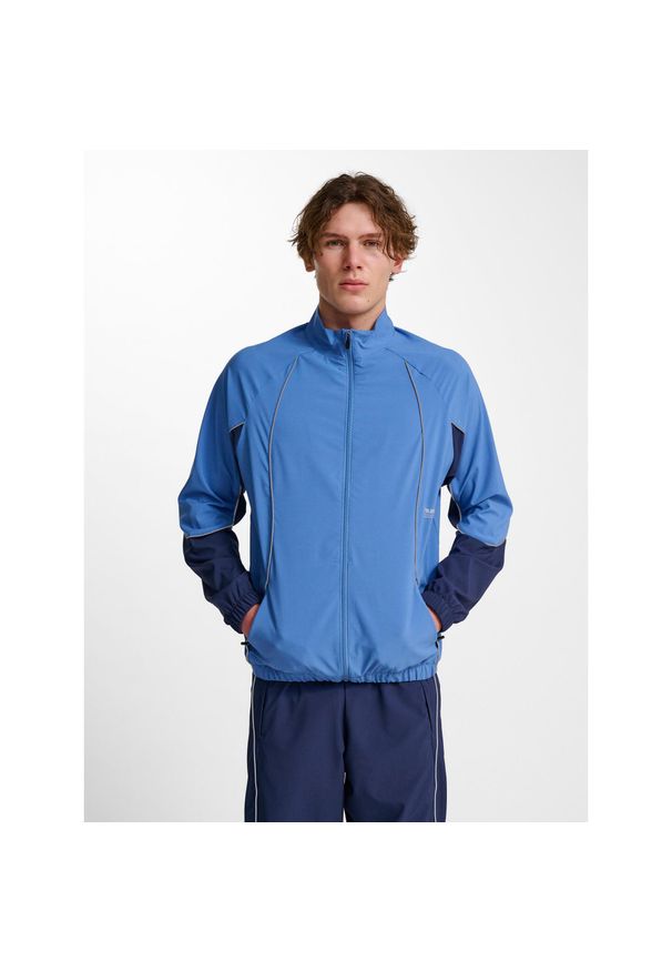 Bluza dresowa zapinana na zamek błyskawiczny Hummel Pulse. Kolor: niebieski. Materiał: dresówka. Sport: fitness