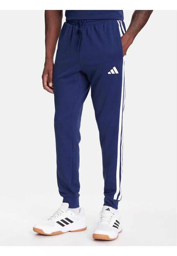 Adidas - adidas Spodnie dresowe Essential 3-Stripes JD1878 Niebieski Regular Fit. Kolor: niebieski. Materiał: syntetyk, bawełna