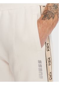 Guess Spodnie dresowe Mickey Z2YB09 KB3P2 Écru Regular Fit. Kolor: kremowy. Materiał: bawełna #2