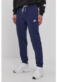 Nike Sportswear - Spodnie. Kolor: niebieski. Materiał: materiał #1