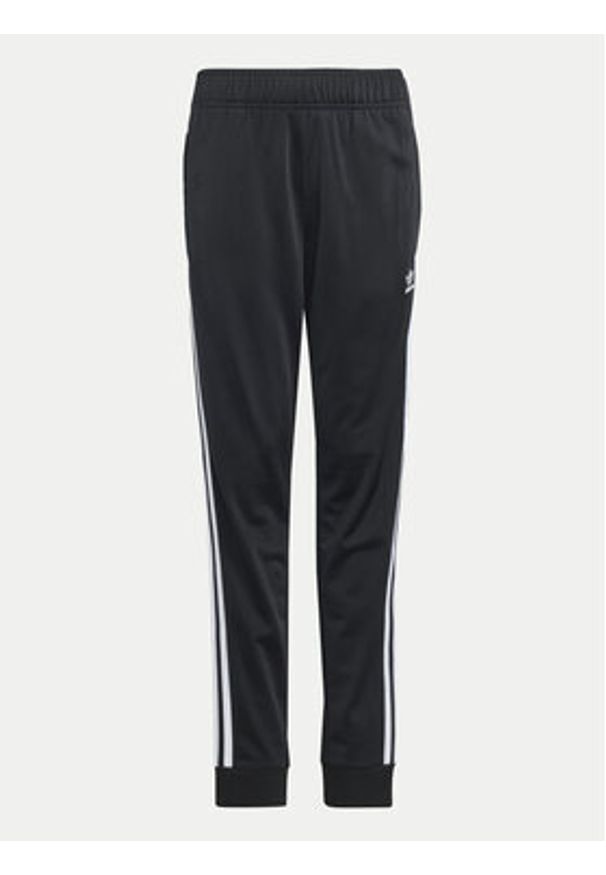 Adidas - adidas Spodnie dresowe adicolor SST IX7630 Czarny Regular Fit. Kolor: czarny. Materiał: syntetyk