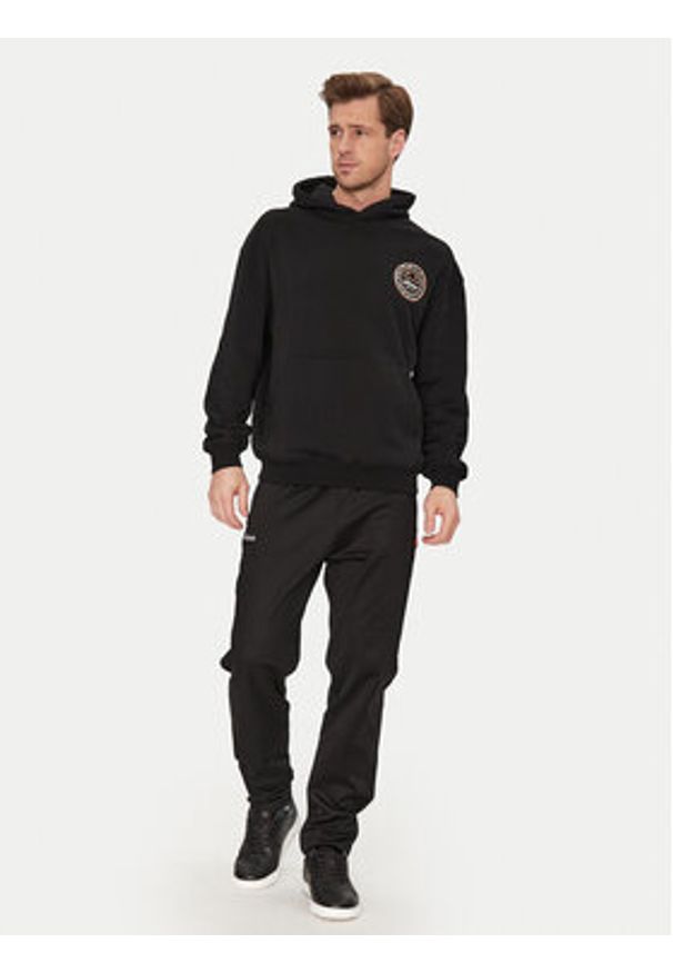 Ellesse Spodnie dresowe Palminteri SHZ22104 Czarny Regular Fit. Kolor: czarny. Materiał: bawełna, syntetyk