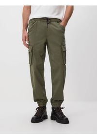 Reserved - Jeansy cargo jogger - zielony. Kolor: zielony. Materiał: jeans
