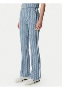 Lacoste Spodnie dresowe XF9313 Niebieski jasny Regular Fit. Kolor: niebieski. Materiał: syntetyk #1
