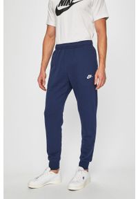 Nike Sportswear - Spodnie BV2671. Kolor: niebieski. Materiał: bawełna, poliester, materiał, dzianina. Wzór: gładki #1