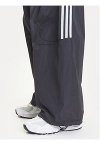 Adidas - adidas Spodnie dresowe adicolor Teamgeist JD0256 Czarny Oversize. Kolor: czarny. Materiał: syntetyk #4