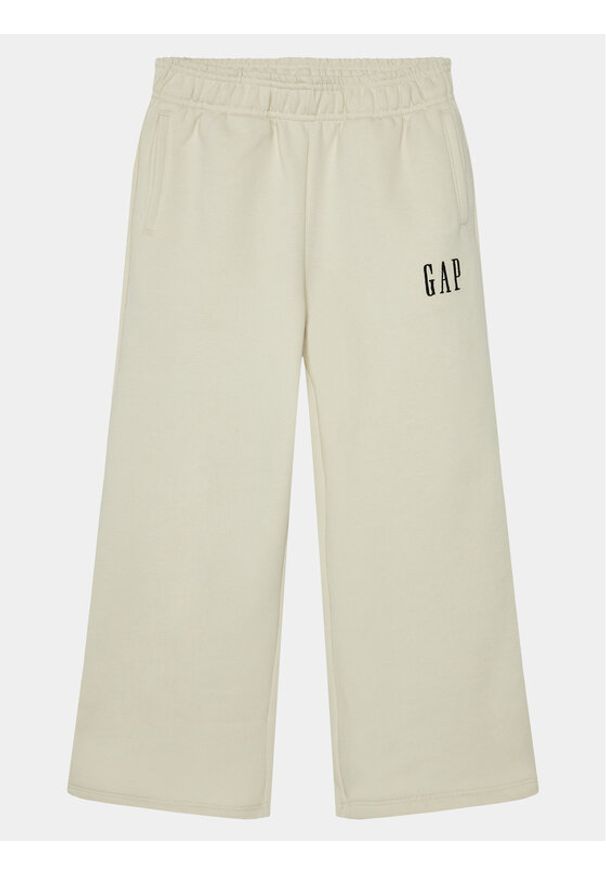 GAP - Gap Spodnie dresowe 739992-00 Beżowy Relaxed Fit. Kolor: beżowy. Materiał: bawełna