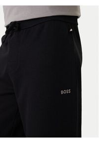 BOSS Spodnie dresowe Waffle 50535878 Czarny Regular Fit. Kolor: czarny. Materiał: syntetyk, bawełna #4