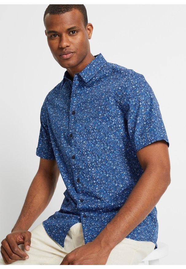 bonprix - Koszula z krótkim rękawem z czystej bawełny. Kolor: niebieski. Materiał: bawełna. Długość rękawa: krótki rękaw. Długość: krótkie. Wzór: nadruk. Styl: elegancki