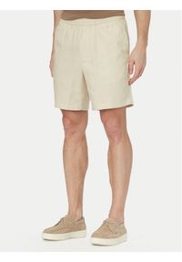 Calvin Klein Szorty materiałowe LV04LF620G Beżowy jasny Straight Fit. Kolor: beżowy. Materiał: bawełna #1