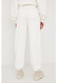 Tommy Jeans Spodnie damskie kolor biały z aplikacją. Stan: podwyższony. Kolor: biały. Materiał: bawełna. Wzór: aplikacja #4