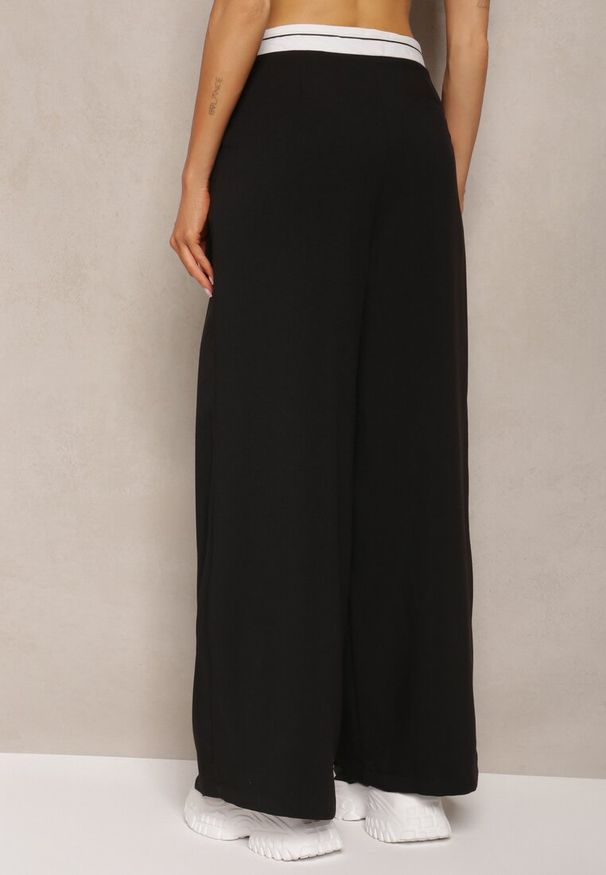 Renee - Czarne Spodnie z Wiskozy Palazzo High Waist Zapinane na Suwak Nellieva. Okazja: na co dzień. Stan: podwyższony. Kolor: czarny. Materiał: wiskoza. Styl: casual
