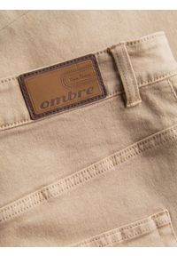 Ombre Clothing - Jeansowe spodnie męskie bez przetarć SLIM FIT - beżowe V8 OM-PADP-0148 - XXL. Okazja: na co dzień. Kolor: beżowy. Materiał: jeans. Wzór: gładki. Styl: casual, elegancki, sportowy #7