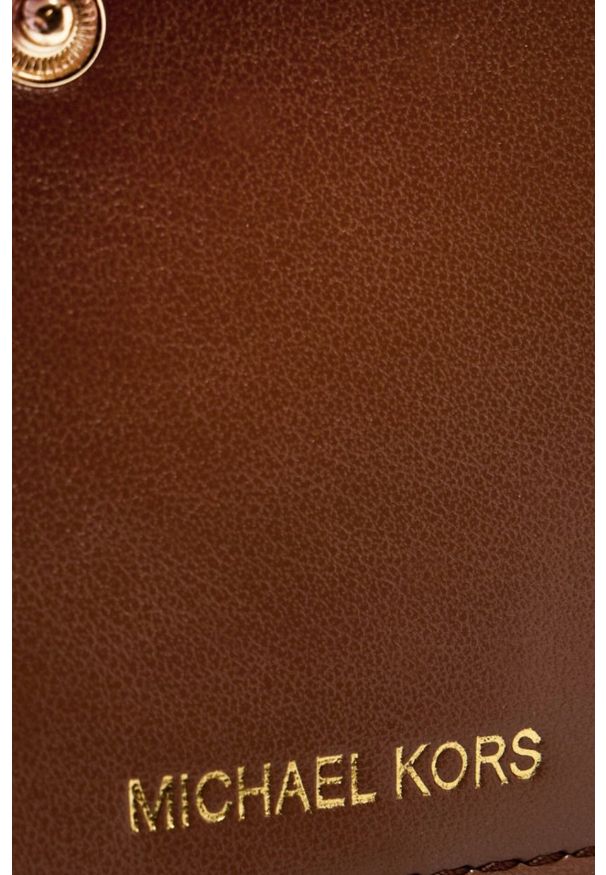 Michael Kors - MICHAEL KORS Brązowy portfel z monogramem. Kolor: brązowy. Materiał: skóra ekologiczna