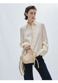 Reserved - Torebka shopper - kremowy. Kolor: kremowy. Materiał: skórzane #1