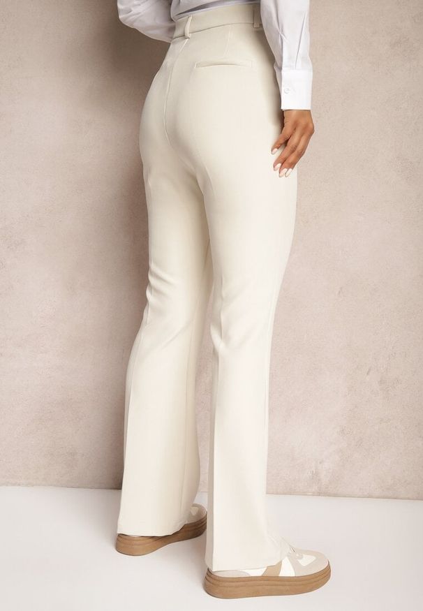 Renee - Beżowe Spodnie Dzwony High Waist z Imitacją Kieszeni Semirlla. Stan: podwyższony. Kolor: beżowy. Styl: klasyczny