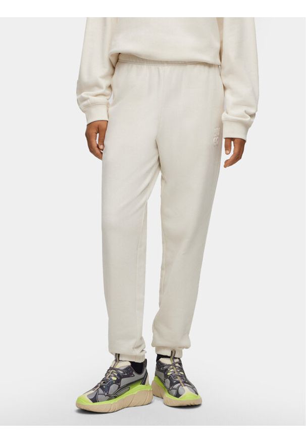 Hugo Spodnie dresowe 50500460 Biały Relaxed Fit. Kolor: biały. Materiał: bawełna