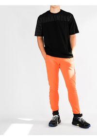 Bikkembergs Spodnie | C 1 021 80 M 3809 | Mężczyzna | Pomarańczowy. Okazja: na co dzień. Kolor: pomarańczowy. Materiał: bawełna, poliester. Wzór: aplikacja. Styl: casual