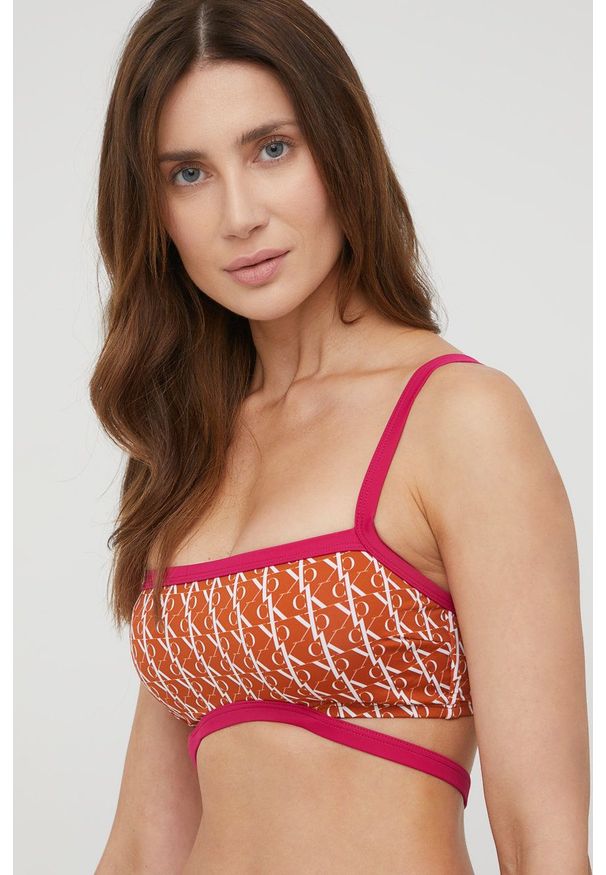 Calvin Klein biustonosz kąpielowy kolor brązowy lekko usztywniona miseczka. Kolor: brązowy. Materiał: dzianina, poliamid