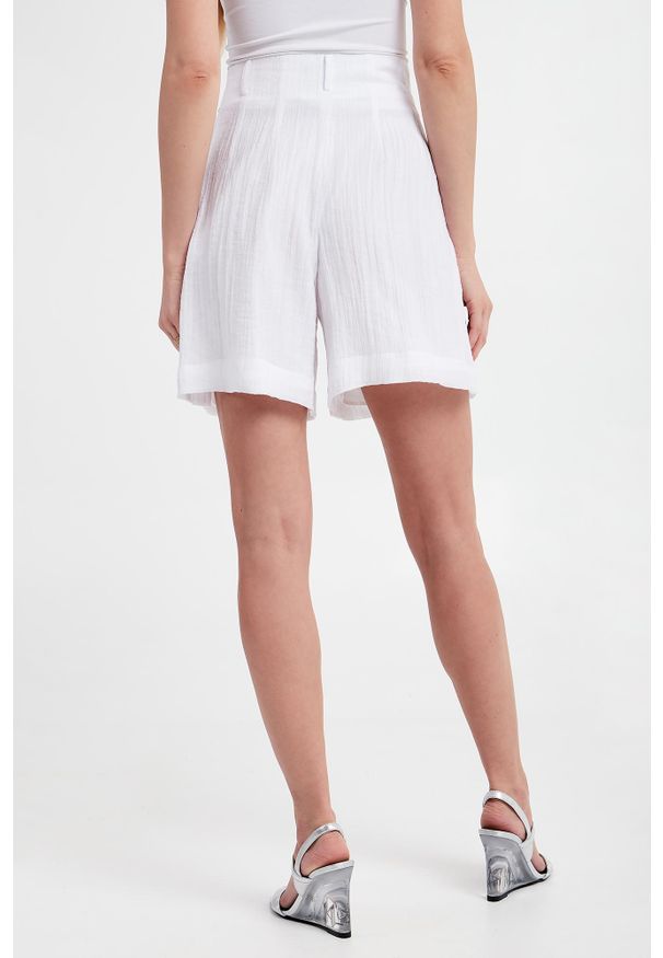 Armani Exchange - Spodnie damskie z lyocellu ARMANI EXCHANGE. Stan: podwyższony