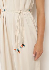 Born2be - Jasnobeżowy Kombinezon na Cienkich Regulowanych Ramiączkach ze Ściągaczem w Talii Huetta. Okazja: na co dzień. Kolor: beżowy. Materiał: jeans. Długość rękawa: na ramiączkach. Długość: długie. Styl: casual, elegancki, sportowy #6