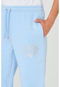 Juicy Couture - JUICY COUTURE Błękitne damskie spodnie Heart Diamante, Rozmiar XS. Kolor: niebieski. Materiał: poliester, skóra, bawełna. Wzór: aplikacja #4