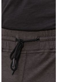 Puma Spodnie 520872 męskie kolor czarny melanżowe. Kolor: czarny. Materiał: materiał, dzianina. Wzór: melanż #4