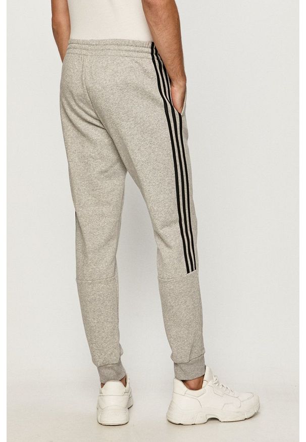 Adidas - adidas - Spodnie. Okazja: na co dzień. Kolor: szary. Materiał: dzianina. Styl: casual
