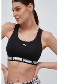 Puma biustonosz sportowy Feel It kolor czarny. Kolor: czarny. Materiał: skóra, materiał. Rodzaj stanika: wyciągane miseczki. Sport: fitness, taniec #1