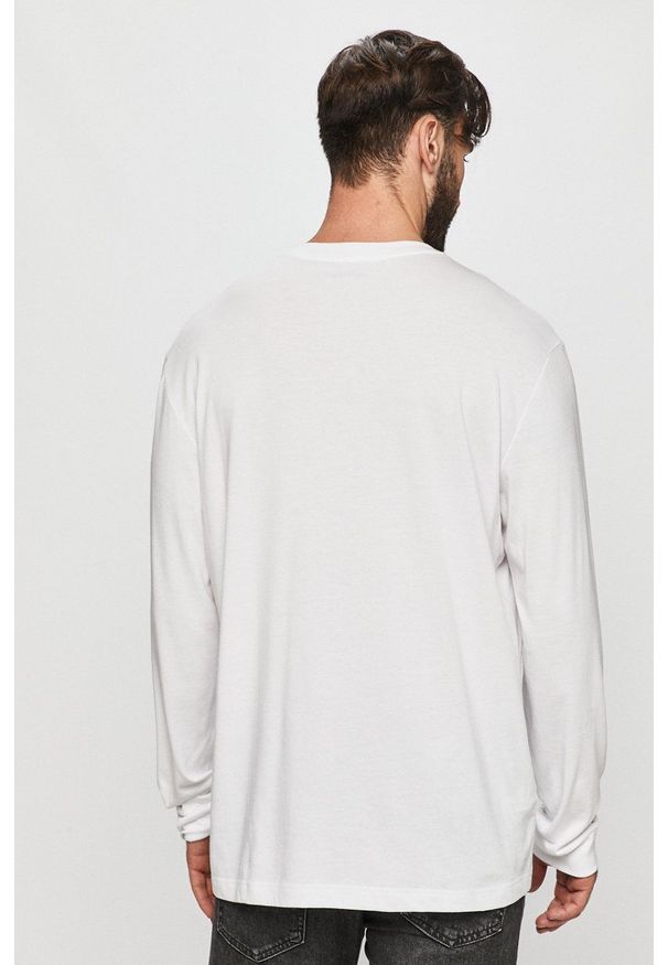 Lacoste - Longsleeve. Okazja: na co dzień. Kolor: biały. Materiał: dzianina. Długość rękawa: długi rękaw. Styl: casual