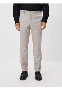 Reserved - Spodnie slim fit w kratę - beżowy. Kolor: beżowy. Materiał: tkanina, wiskoza #1