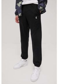 adidas Originals spodnie męskie kolor czarny z nadrukiem. Kolor: czarny. Materiał: poliester, dzianina, bawełna. Wzór: nadruk