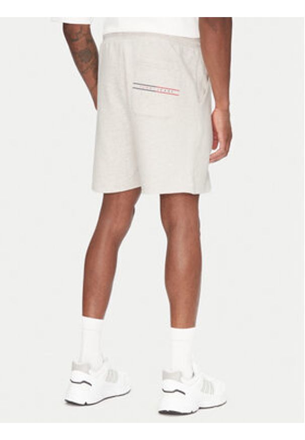 Tommy Jeans Szorty sportowe Entry Graphic DM0DM21369 Beżowy Regular Fit. Kolor: beżowy. Materiał: bawełna. Styl: sportowy